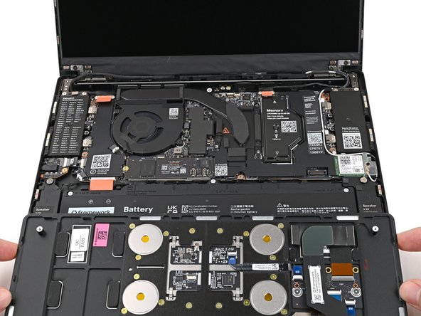 Position the Input Cover, Keyboard down, on top of the Laptop so it just covers the Battery.