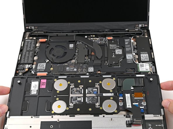 This allows the Touchpad Cable to be folded over and reconnected without straining it.