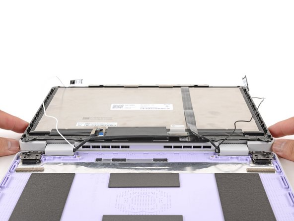 Use your fingers to lift the hinges over the Top Cover lip.