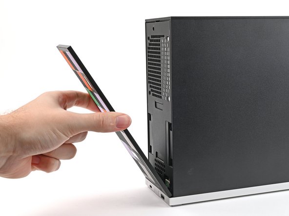 Press the Front Panel flat to the chassis and let it align to the magnets.