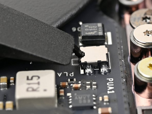 Use your finger or the flat end of a Framework Screwdriver to do the following actions 10 times: