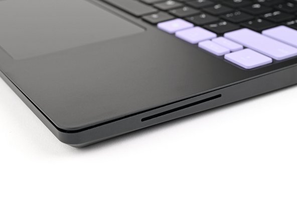 The bottom right corner of the Input Cover won't sit flush with the laptop until you tighten its screws.