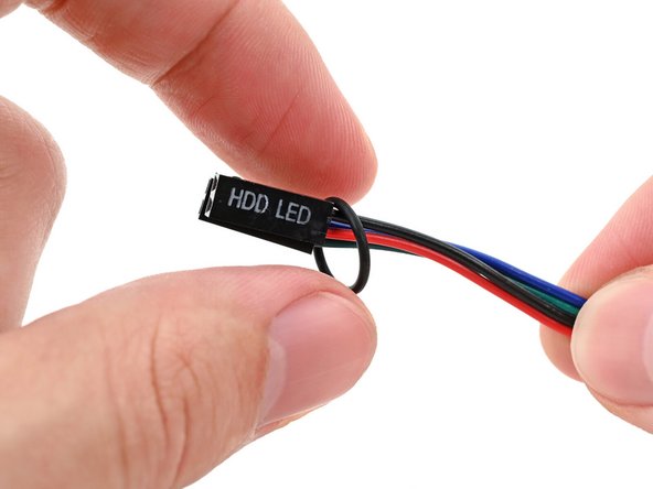 Thread the O-ring over the power button cable and slide it down the length of the cable.