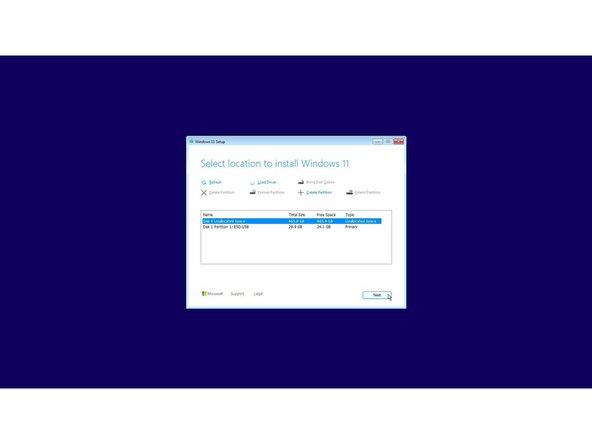The cursor may not appear until after swiping on the touchpad for a few seconds.  If the cursor still doesn't appear, hard power down the laptop by holding the power button until the system shuts off.  Wait 15 seconds, and power on again. You can also use the Tab and Enter keys on the keyboard or an external USB mouse to complete the installation.
