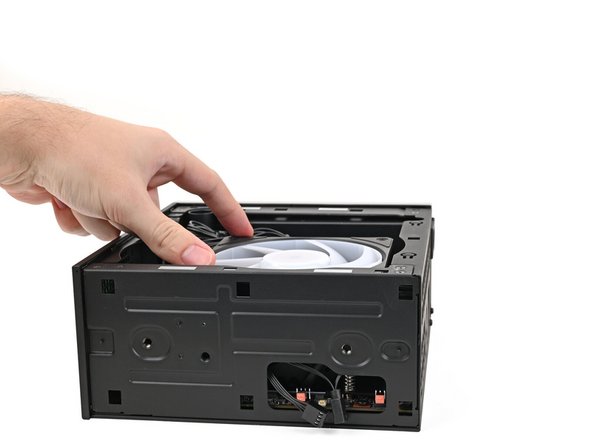 If your fan has an arrow indicating airflow direction, make sure it's pointed towards the heatsink.