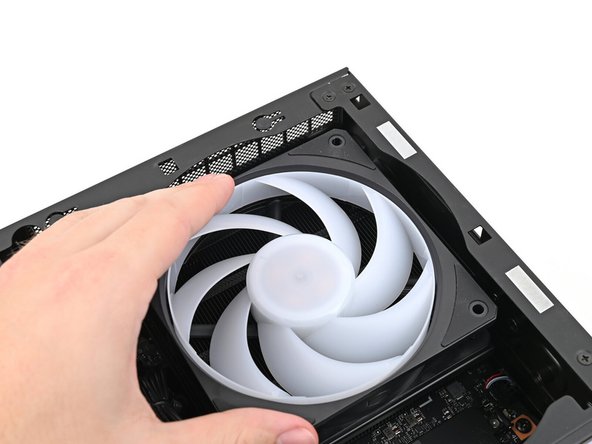 If you're installing an RGB fan, make sure the &quot;male&quot; end of the RGB cable is covered and set aside in the corner of the chassis.