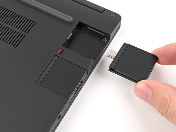 Pull the Expansion Card out of its slot and remove it.