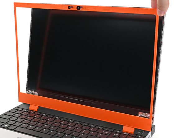 Align the bezel over the perimeter of the display and let the magnets pull the bezel into place.