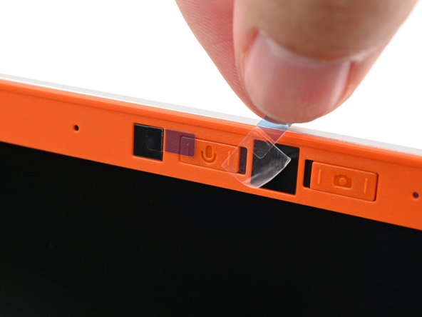 If there are any plastic liners covering the webcam and microphone, remove them.