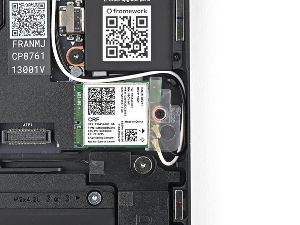 The module might pop up at a shallow angle when you loosen the screw.