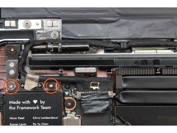 Using the T5 bit in the Framework screwdriver, the two fasteners on the left and right Hinges connecting to the Bottom Cover will need to be un-fastened.