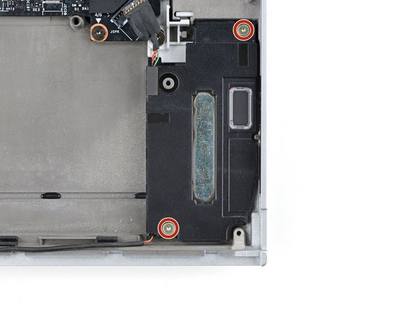 Use your Framework Screwdriver to remove the two 2.0 mm‑long T5 Torx screws securing each speaker (four in total).
