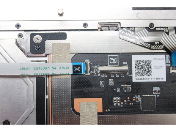 Slide the cable in until the white line is almost at the edge of the connector.