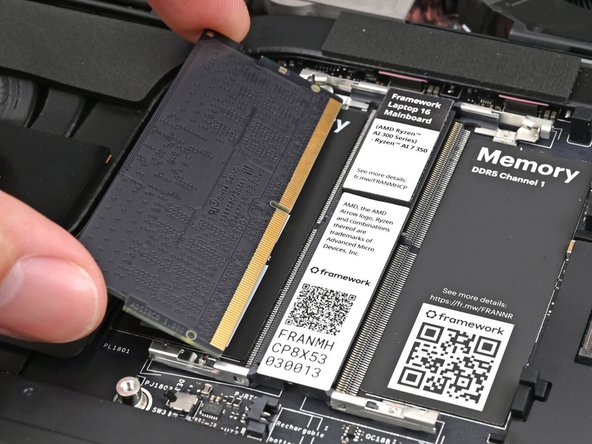 Hold the memory module by its edges. Don't touch the gold contacts with your fingers. If you do, wipe the contacts with a clean, lint-free cloth to remove any finger oils.