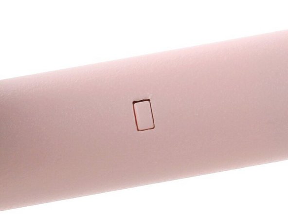 Slide the battery into the Stylus until you hear a click. You should feel very little resistance.