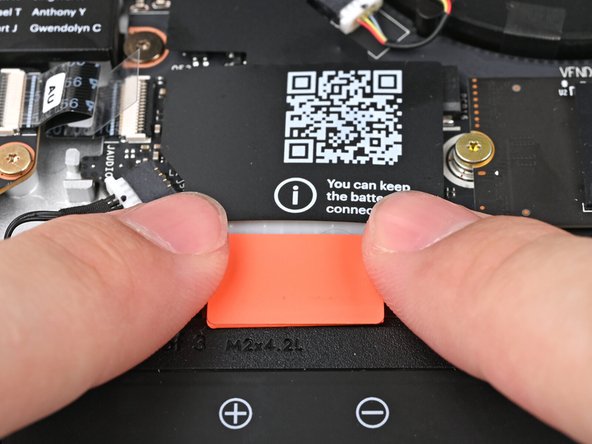 Use your fingers to align the Battery connector with its socket and slide it straight in to reconnect the Battery.