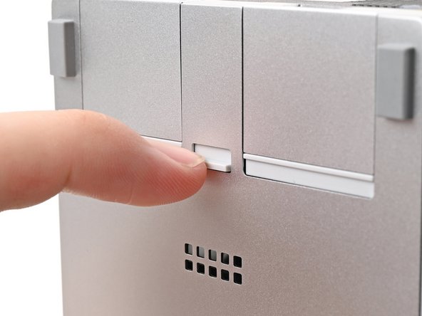 Locking the Expansion Card slots helps keep the cards in place when you unplug cables from them.