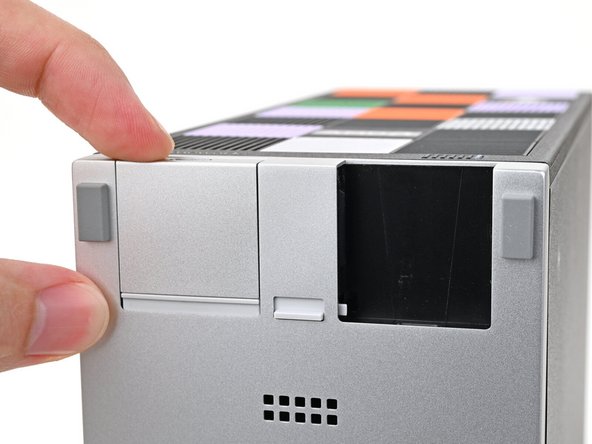 You don't need to unlock the latch to install the Expansion Cards—only when you want to remove them.