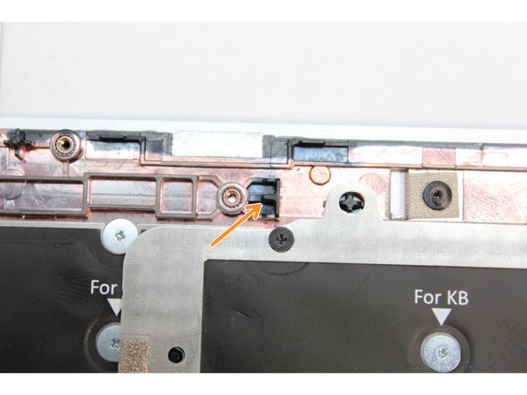Find the alignment notch on the Bottom Cover as indicated in the second image.