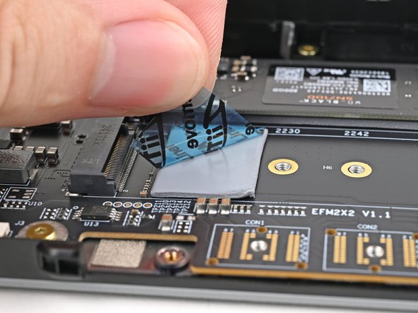 Remove the blue liner to expose its top side.