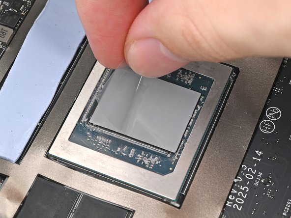 Remove the clear liner from the thermal pad to expose its top side.