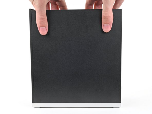 Use your fingers to grip the top of the Right Panel and slide it upward to release its clips.