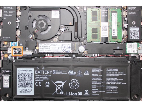 Using both fingers and a slight amount of force, disconnect the Speaker cable from the Mainboard by pulling it straight out.