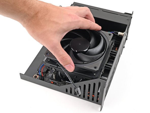 If your fan has an arrow indicating airflow direction, make sure it's pointed towards the heatsink.