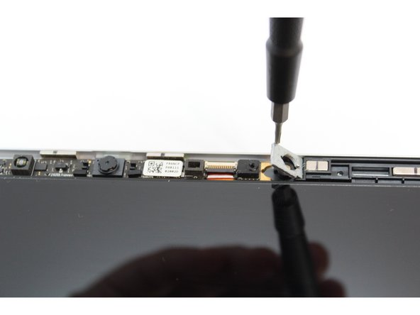 Remove the washers under the screws.