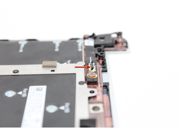 Make sure the black latch on the connector is flipped up so that you can slide the Fingerprint Cable into the connector.