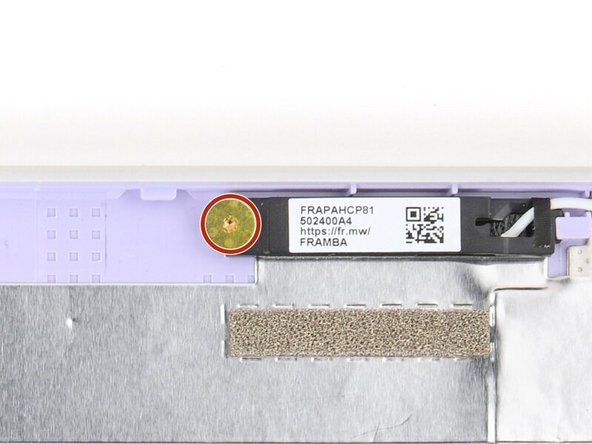 Use your Framework Screwdriver to install the two (one per antenna) 2.5 mm‑long T5 Torx screws to secure the antennas to the Top Cover.
