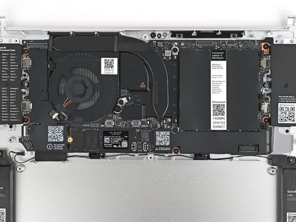 Use your Framework Screwdriver to install the five 1.5 mm‑long T5 Torx screws securing the Mainboard.