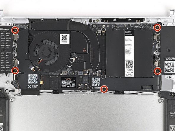 Use your Framework Screwdriver to install the five 1.5 mm‑long T5 Torx screws securing the Mainboard.