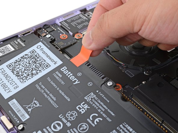 The battery connector can be tight, requiring some force. If it feels like part of the battery won't come up, check that the battery screws are fully loosened.