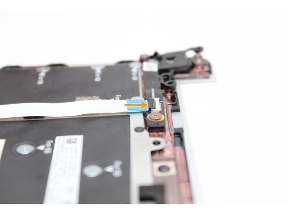 Flip the black latch down to secure the cable.