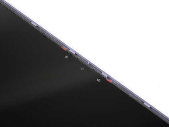 The top edge shouldn't have any gaps when the display's in place.