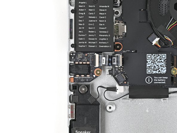 Use your Framework Screwdriver to install the 3.0 mm‑long T5 Torx screw securing the Audio Board.