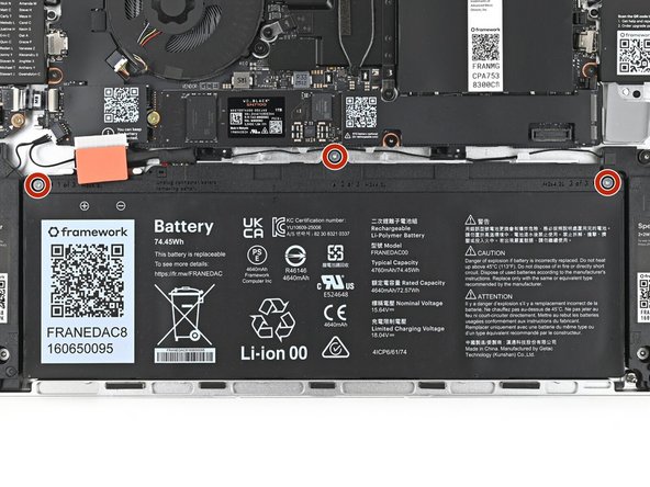 Use your Framework Screwdriver to tighten the three captive T5 Torx screws securing the Battery.