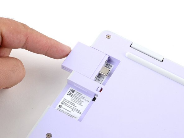 Slide an Expansion Card into the Expansion Card slot.