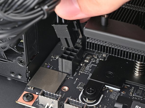 Orient the CPU power supply cable so its clip is facing the heatsink.