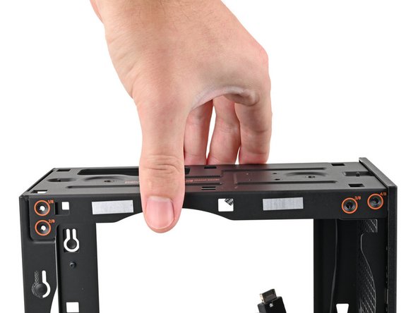 Lift the top plate off the Desktop and remove it.