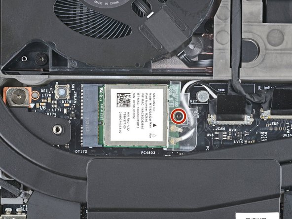 Use your Framework Screwdriver to tighten the captive T5 Torx screw securing Wi-Fi module.