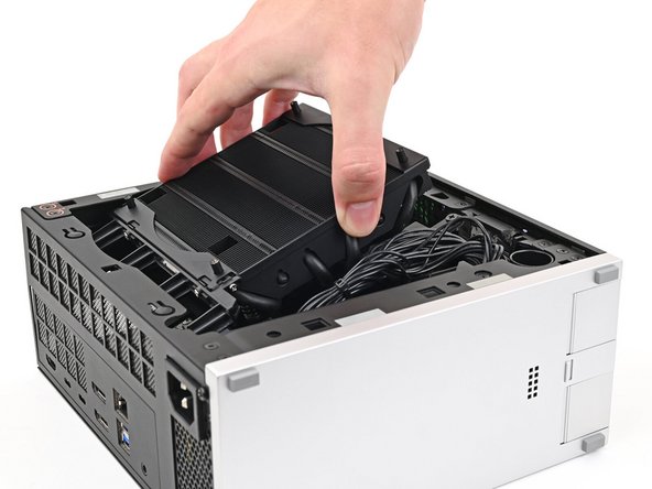 When handling the Heatsink, grab from the left and right sides (sides facing Front Panel &amp; Back IO) as to prevent bent fins and possible damage to the Heatsink.
