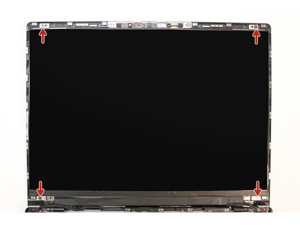 Using the T5 bit in the Framework Screwdriver, unscrew the 4 fasteners connecting the Display to the Top Cover.