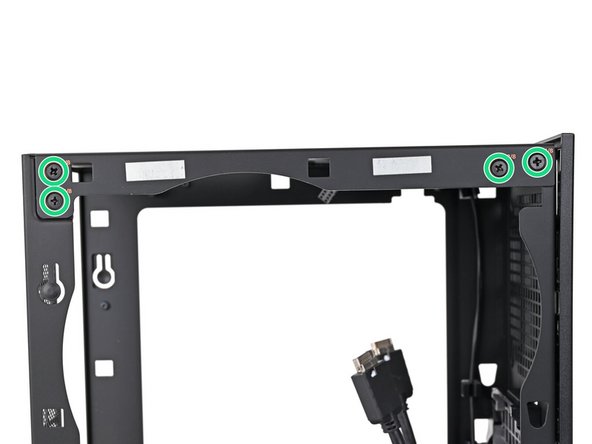 While holding the Desktop steady, use your Framework Desktop Screwdriver to remove the eight 4.0 mm‑long Phillips screws securing the top plate.