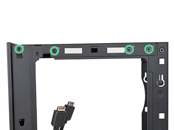 While holding the Desktop steady, use your Framework Desktop Screwdriver to remove the eight 4.0 mm‑long Phillips screws securing the top plate.