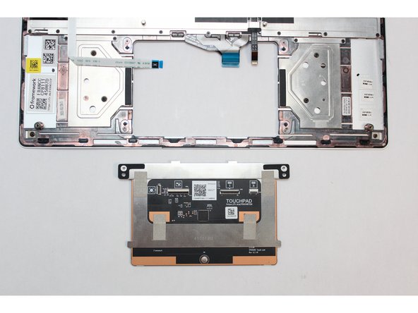 You can now remove the module by lifting up the Input Cover and gently pushing the module up so that it is easier to grab in image one.
