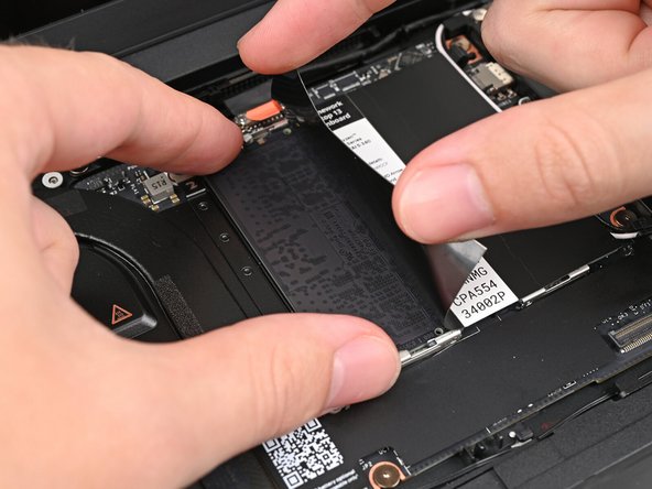 Insert the contact edge into the socket at a shallow angle. The gold contacts should mostly be covered by the socket.