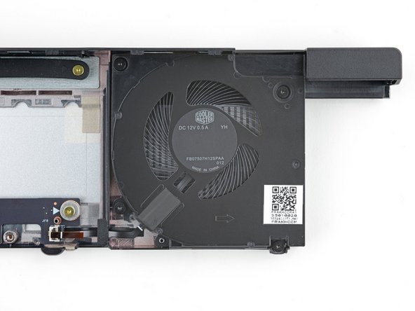 Use your Framework Screwdriver to loosen the four captive Torx T5 screws securing the fan.