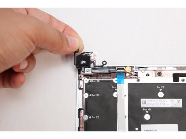 Your Framework Screwdriver has a double-sided bit!  One end is the T5 bit, the other end is the PH0 bit. To switch from the T5 bit to the PH0 bit, pull the bit out using your fingers, flip it around, and place it back into the screwdriver!